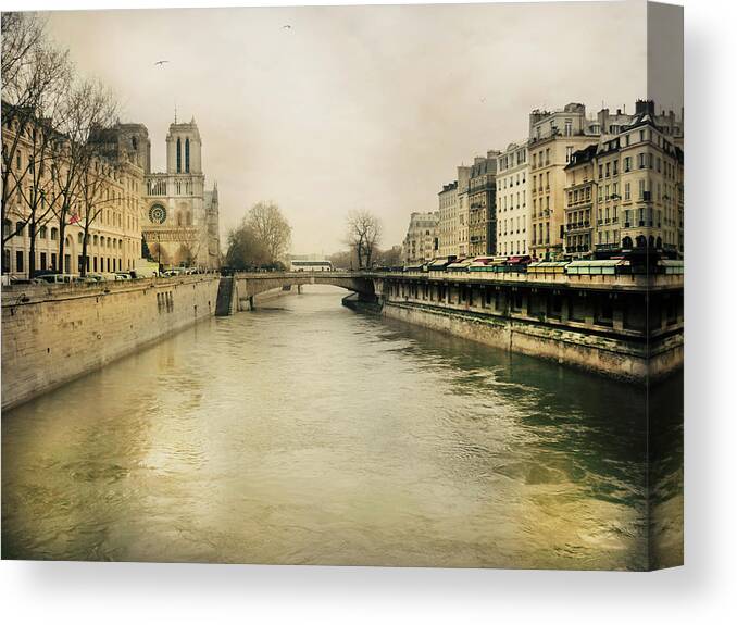 Built Structure Canvas Print featuring the photograph The River Seine And Saint-michel Bridge by Elizabeth Fernandez