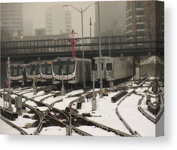 Trains Canvas Print featuring the photograph Trains On Snow Covered Tracks by Alfred Ng