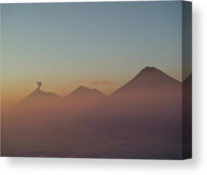 Scenics Canvas Print featuring the photograph Volcano Eruption by Jmartinc