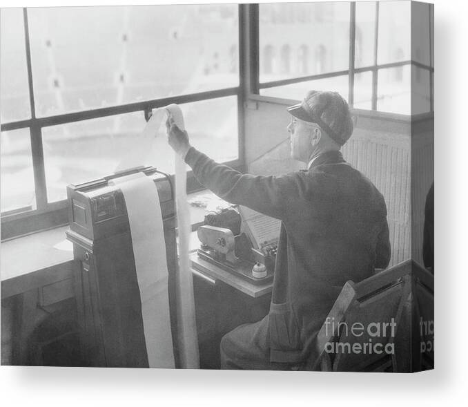 People Canvas Print featuring the photograph William Henne Using Teletype Machine by Bettmann