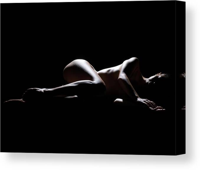 Tranquility Canvas Print featuring the photograph Woman Lying Down In The Dark by Michael H