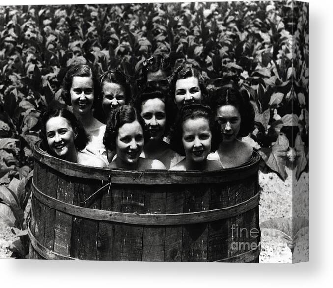 People Canvas Print featuring the photograph Women In A Barrel by Bettmann