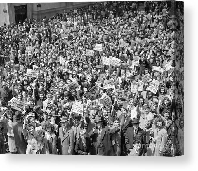 Crowd Of People Canvas Print featuring the photograph World War II Victory Day Showing by Bettmann