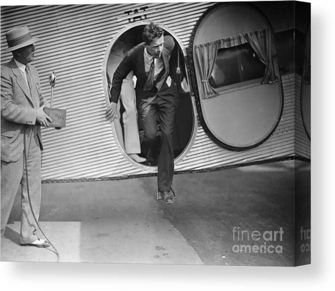  Canvas Print featuring the photograph 1920S Aviator Charles Lindbergh Stepping Out Of... by Camerique