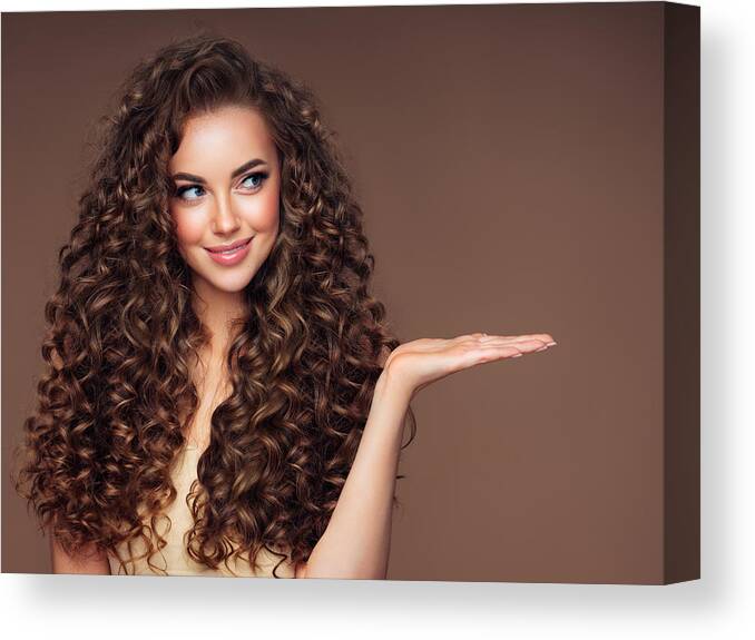 Empty Canvas Print featuring the photograph Beautiful woman with voluminous curly hairstyle by CoffeeAndMilk