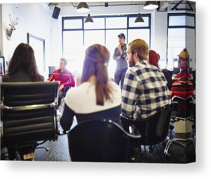 Expertise Canvas Print featuring the photograph All office meeting in high tech startup office by Thomas Barwick