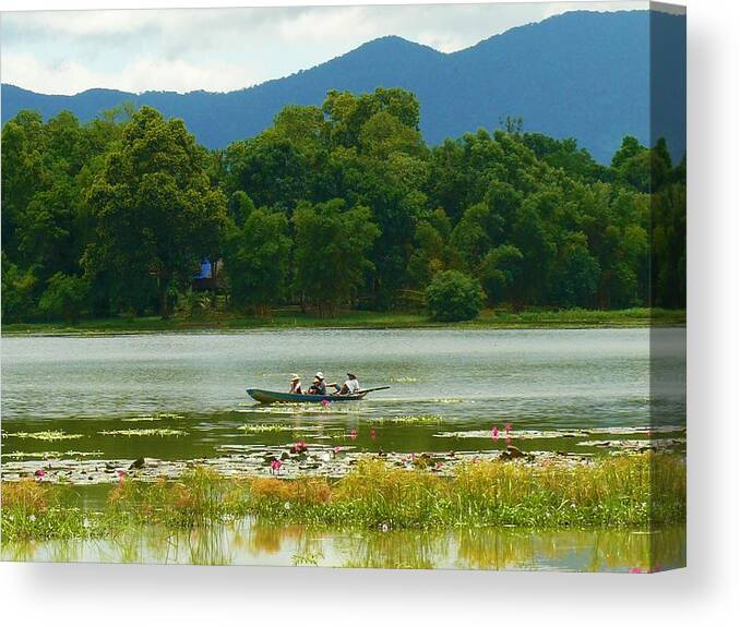 Vietnam Canvas Print featuring the photograph Boat on the Lak Lake by Robert Bociaga