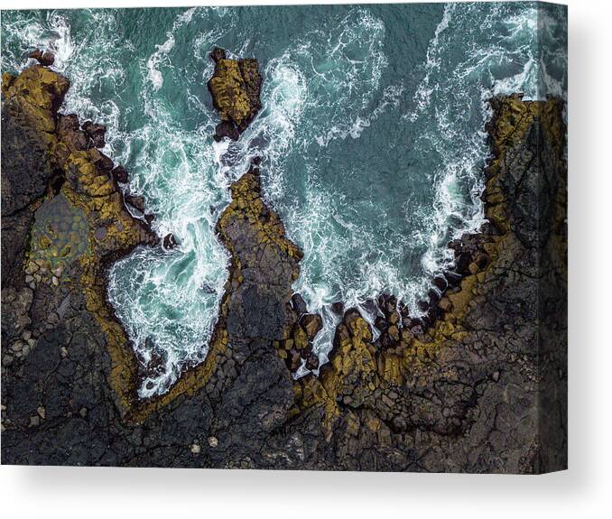 Iceland Canvas Print featuring the photograph Brimketill by Marino Flovent