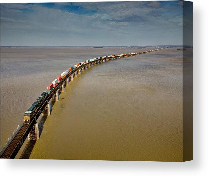 Railroad Canvas Print featuring the photograph CSX Q025 Southbound over the Ohio River Floodwaters by Jim Pearson