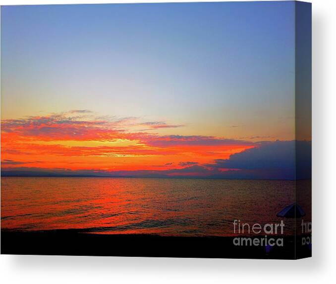 Harmony Of Sunset Over The Seascape Canvas Print featuring the photograph Harmony of Sunset Over The Seascape by Leonida Arte