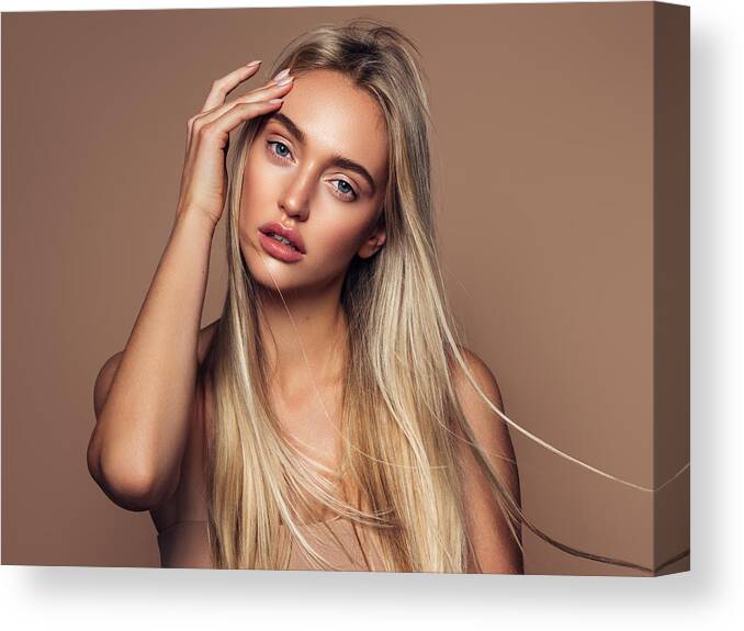 Skin Canvas Print featuring the photograph Portrait of a beautiful woman with natural make-up by CoffeeAndMilk