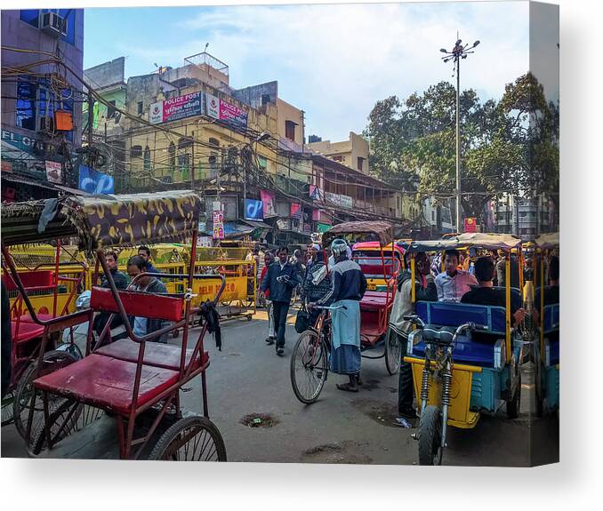 Richshaw Canvas Print featuring the photograph Richshaws in the streets of Delhi by Christine Ley