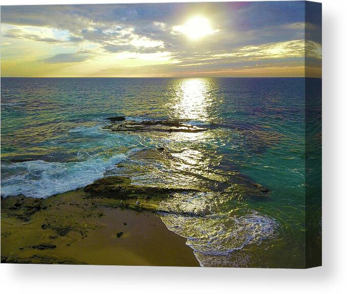 Ocean Canvas Print featuring the photograph Sunset Over the Waves by Marcus Jones