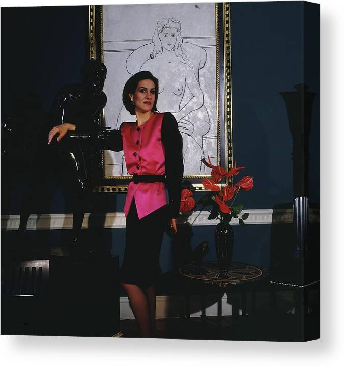 Indoors Canvas Print featuring the photograph Paloma Picasso Wearing A Yves Saint Laurent #1 by Horst P. Horst