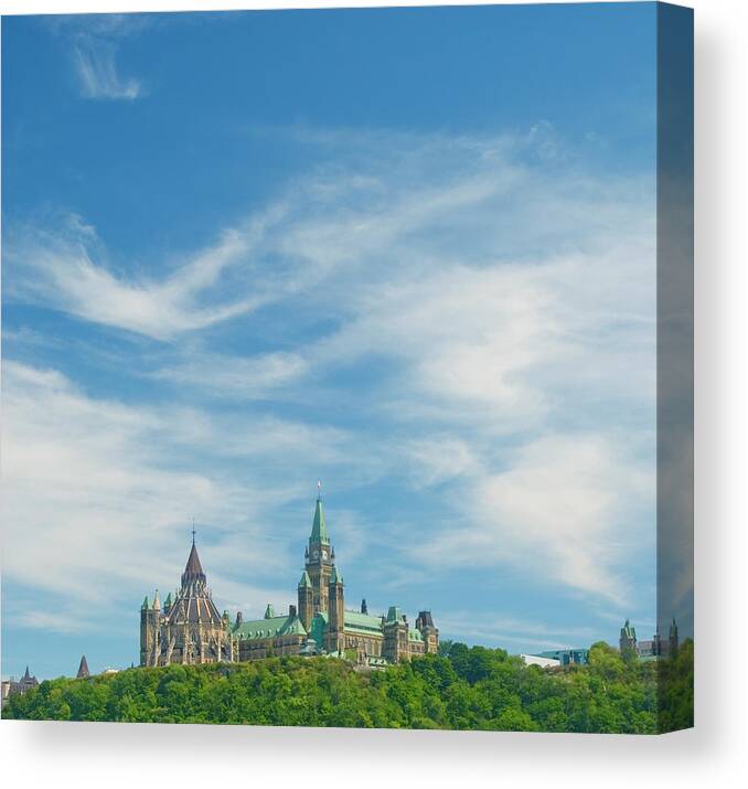Parliament Hill Canvas Print featuring the photograph Parliament On The Hill, Ottawa by Dennis Mccoleman