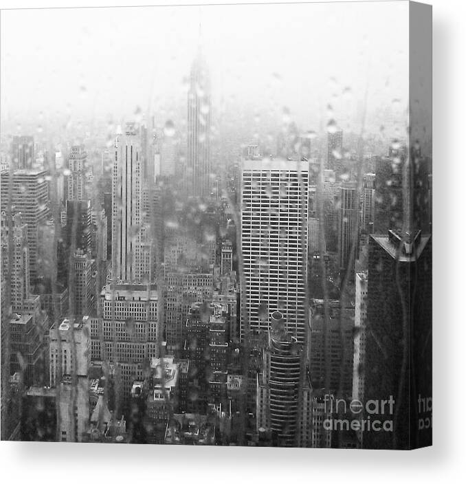 Empire State Building Canvas Print featuring the photograph The Empire in the Rain by Alice Gardoni