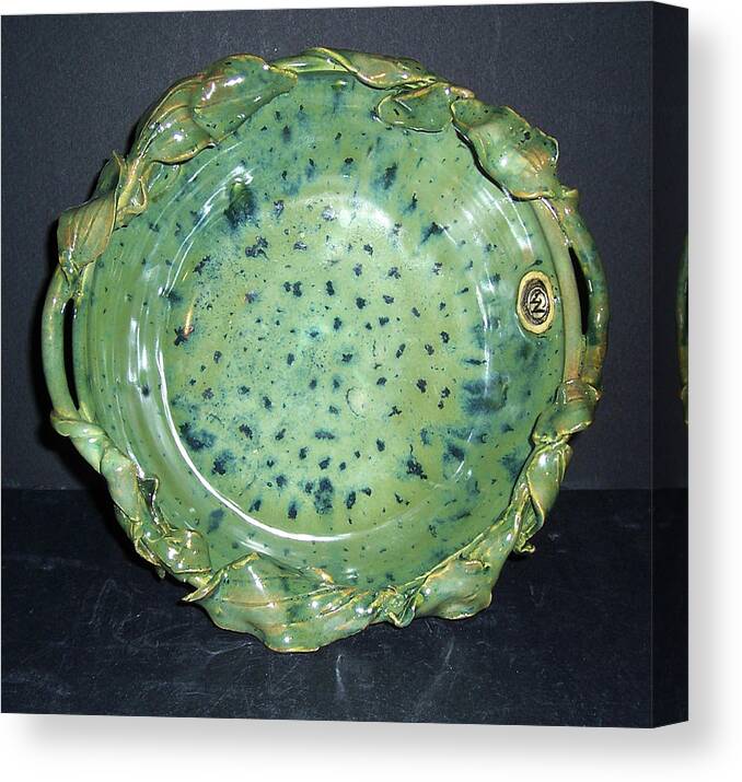 Green Canvas Print featuring the ceramic art Trout Pattern Glaze Bowl with Leaves by Carolyn Coffey Wallace
