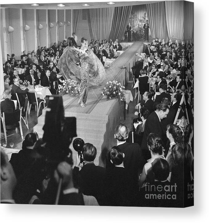 Mid Adult Women Canvas Print featuring the photograph Fashion Model On Runway Wearing H.w by Bettmann