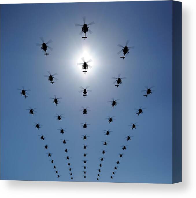 Expertise Canvas Print featuring the photograph Helicopter Silhouette In The Sky by Georgo
