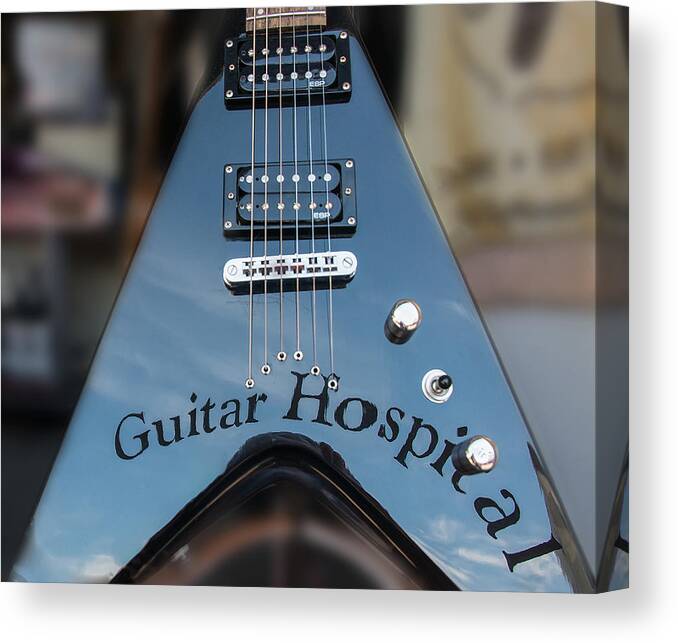 Guitar Canvas Print featuring the photograph A Place For Sick Guitars by Gary Slawsky
