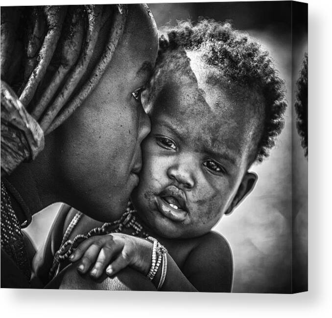 Child Canvas Print featuring the photograph Kiss From Beautiful Himba Mom by Pavol Stranak