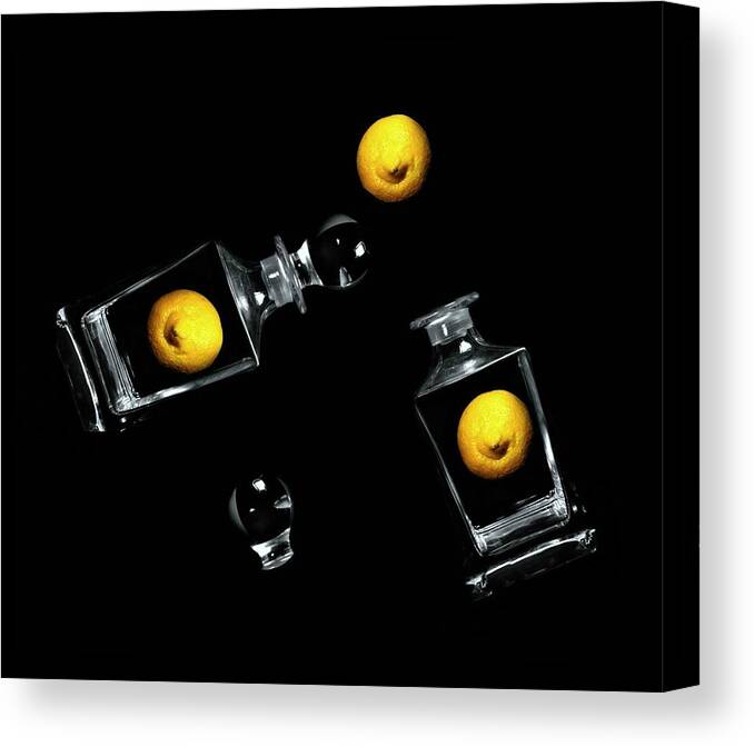 Lemons Canvas Print featuring the photograph Toss Me a Lemon by Diana Angstadt