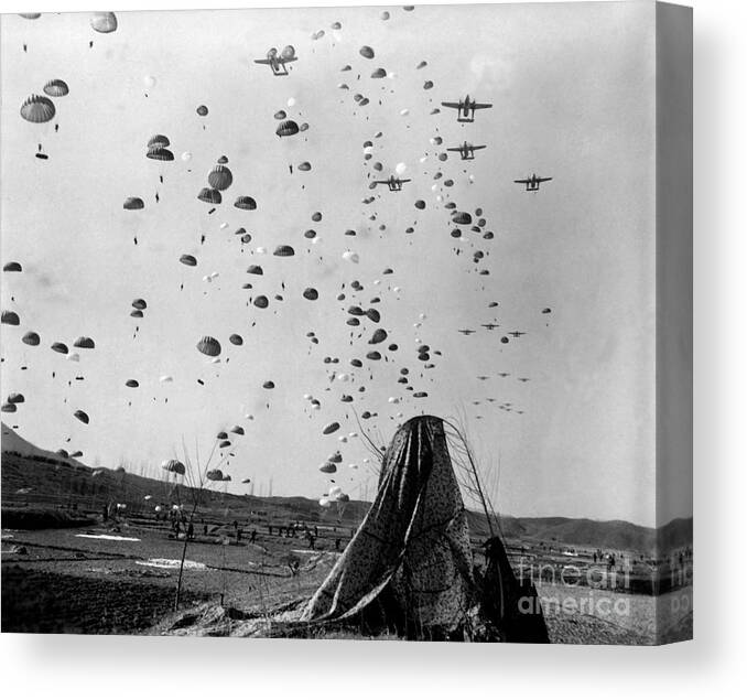 Horizontal Canvas Print featuring the photograph Paratroopers Jump From From C-119s by Stocktrek Images