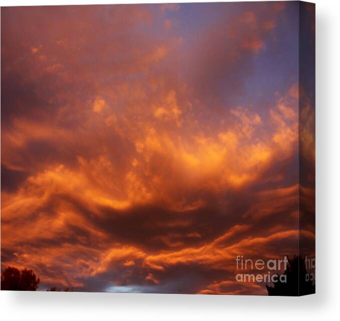 Clouds Canvas Print featuring the photograph Fall Fire by John Langdon