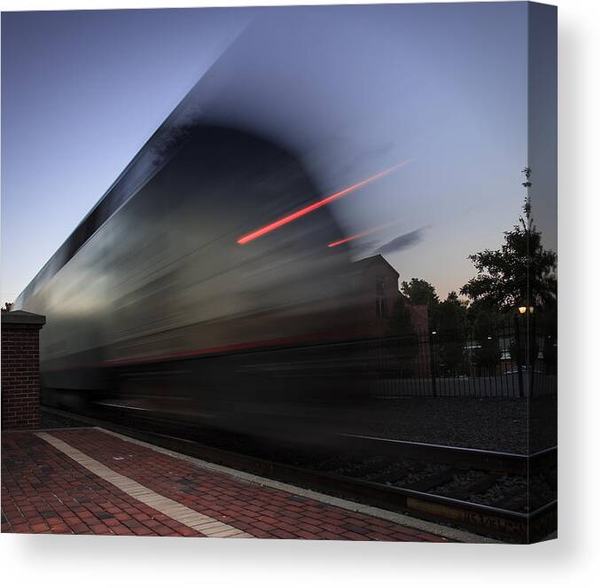 Blur Canvas Print featuring the photograph Train pulling out of the station by Kyle Lee