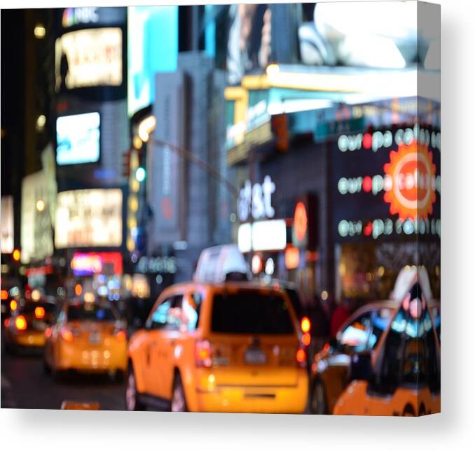 Yellow Cabs At Time Square In New York Canvas Print featuring the photograph Yellow Cabs at Time Square in New York by Marianna Mills