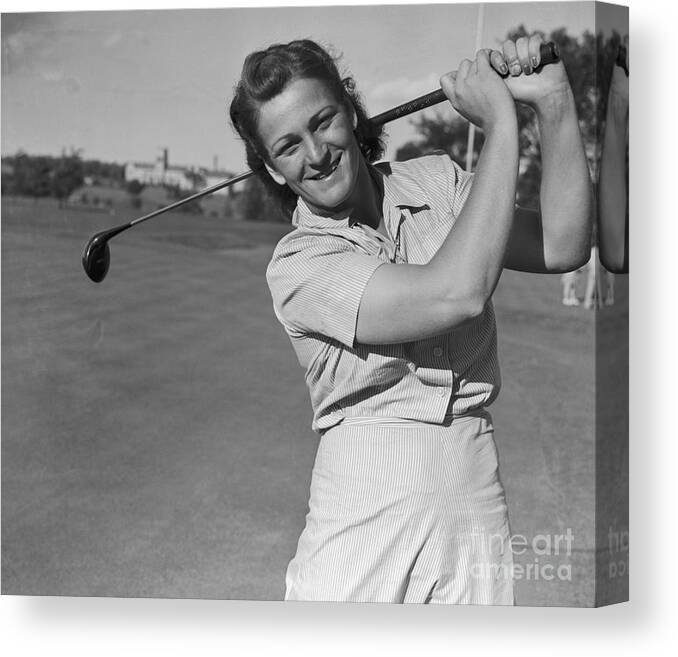 Babe Didrikson Canvas Print featuring the photograph Babe Didrikson Smiling With Golf Club by Bettmann