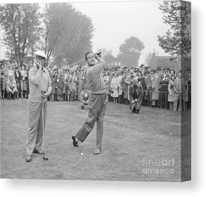 Charity Benefit Canvas Print featuring the photograph Bing Crosby And Bob Hope Goofing by Bettmann