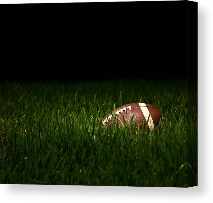 Grass Canvas Print featuring the photograph Football Overgrown With Grass by Spxchrome