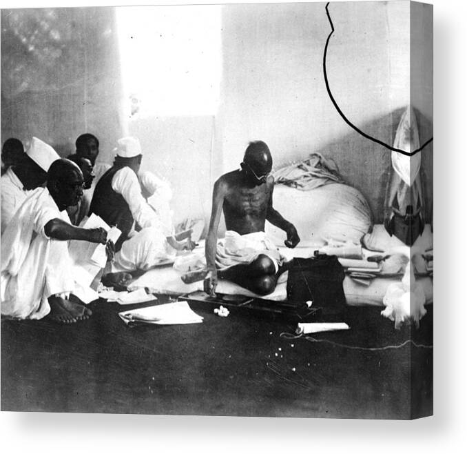 Releasing Canvas Print featuring the photograph Gandhi Spinning by Keystone