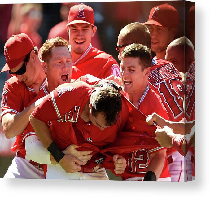 Ninth Inning Canvas Print featuring the photograph Johnny Giavotella and Kole Calhoun by Harry How