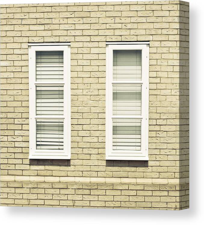 Architecture Canvas Print featuring the photograph Windows #1 by Tom Gowanlock