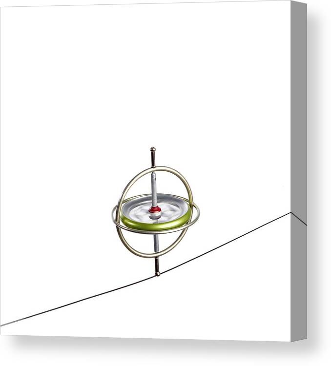 Compass Canvas Print featuring the photograph Gyroscope Balancing On A Wire by Science Photo Library