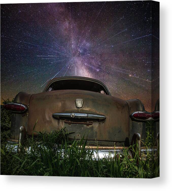 Star Trails Canvas Print featuring the photograph A car's dream... by Aaron J Groen