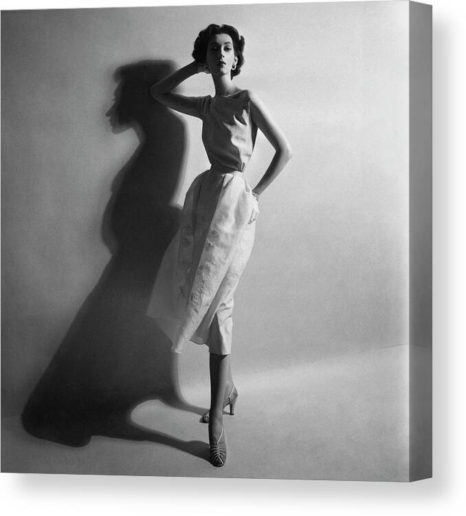 Fashion Canvas Print featuring the photograph A Model In A Sheath Dress by Cecil Beaton