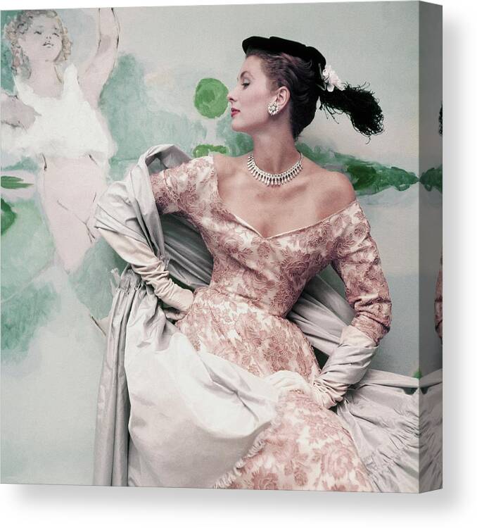 Accessories Canvas Print featuring the photograph A Model Wearing A Balenciaga Dress by Henry Clarke