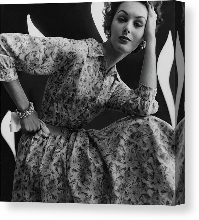 Fashion Canvas Print featuring the photograph A Model Wearing A Floral Dress by Sante Forlano