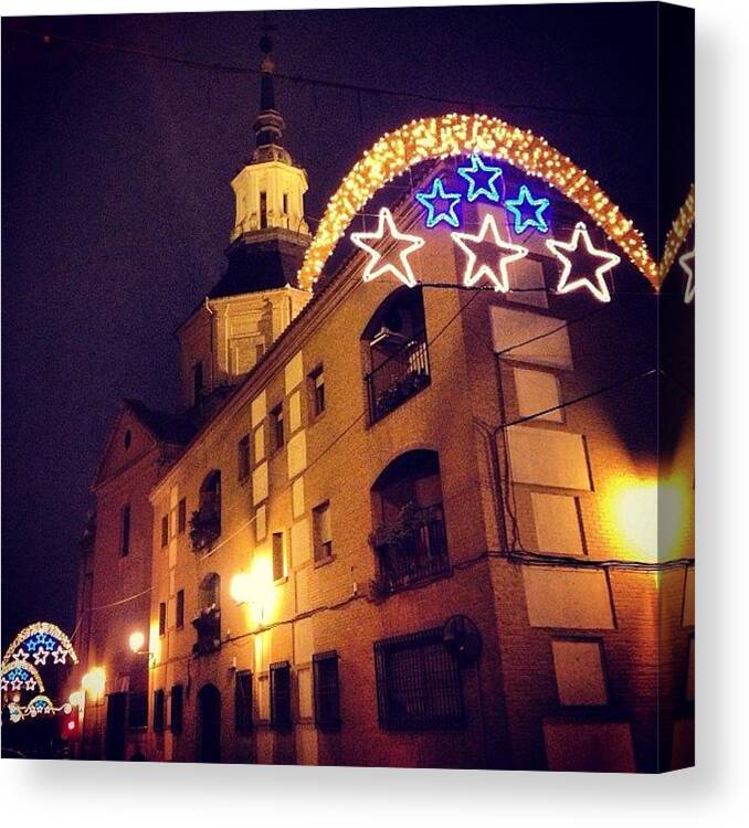 Alcala Canvas Print featuring the photograph Alcala with christmas lights by Ana V