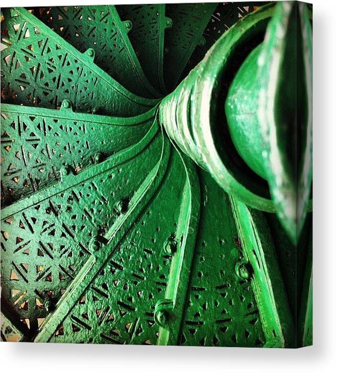  Canvas Print featuring the photograph An Antique Spiral Staircase by Odie Ysn