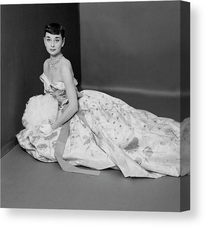 Actress Canvas Print featuring the photograph Audrey Hepburn Wearing An Adrian Dress by Richard Rutledge