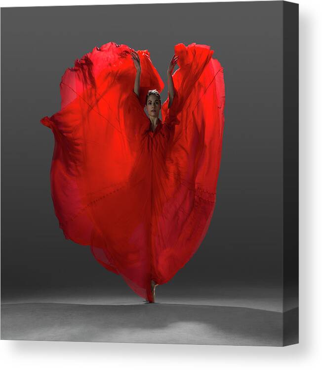 Ballet Dancer Canvas Print featuring the photograph Ballerina On Pointe With Red Dress by Nisian Hughes