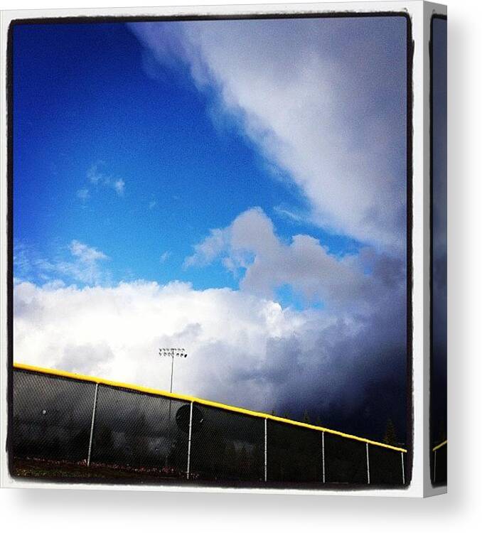  Canvas Print featuring the photograph Blue Skies Amd Rain Clouds by Rachel Houghton