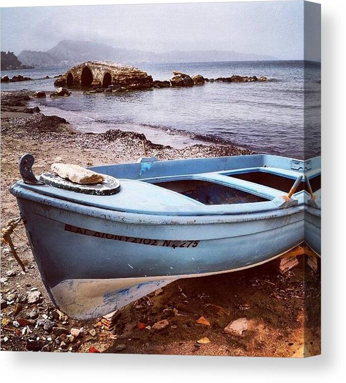 Beaches Canvas Print featuring the photograph Boat On The Beach At Argassi On The by Alistair Ford