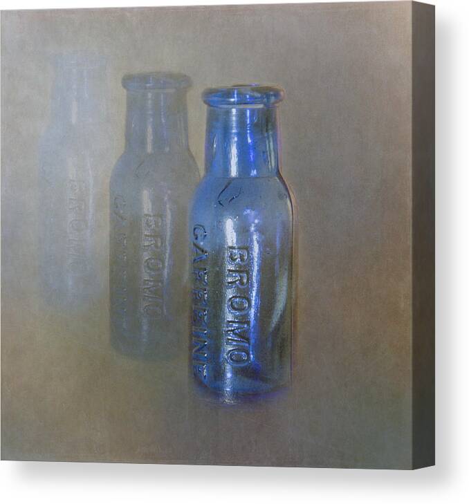 Bromo Caffeine Bottles Canvas Print featuring the photograph Bromo Caffeine Bottles by Angie Vogel