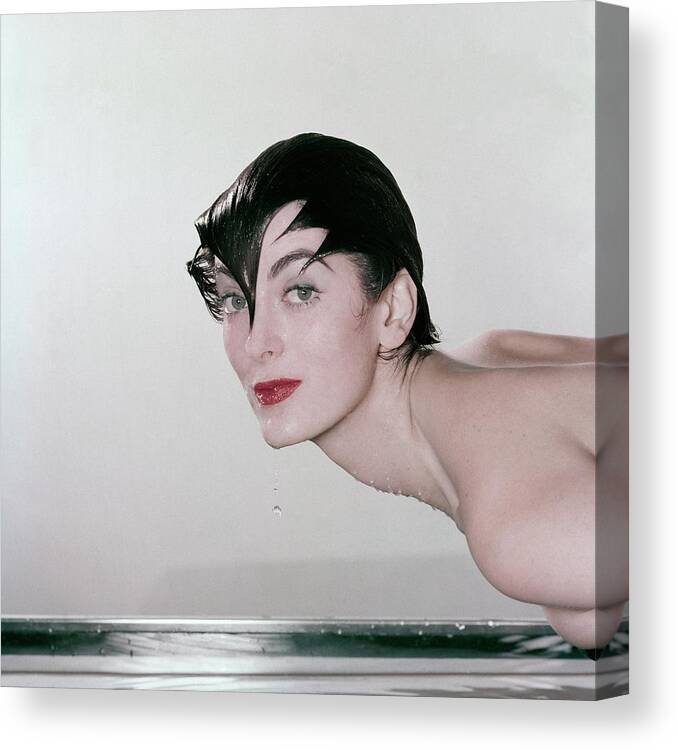 Beauty Canvas Print featuring the photograph Carmen Dell'orefice Demonstrating Waterproof by John Rawlings