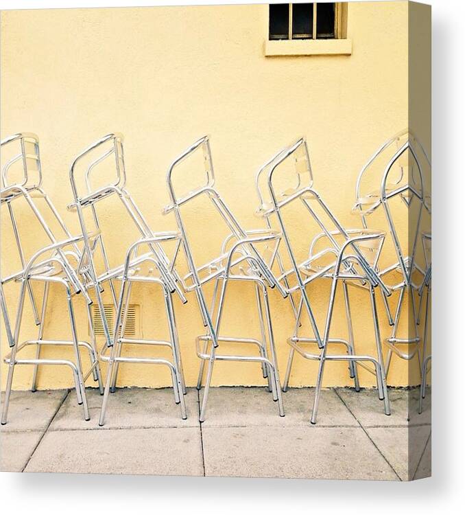Chairs Canvas Print featuring the photograph Chairs Stacked by Julie Gebhardt